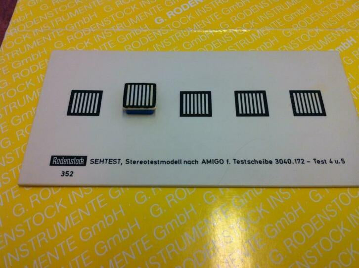 Rodenstock oogtest apparaat met testschijf in koffer