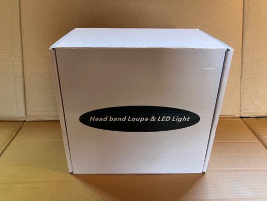 Medische hoofdlamp met loupe (3,5 X vergroting)